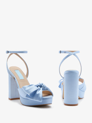 Octavia blue satin platform bridal sandal with asymmetric bow trim by Charlotte Mills